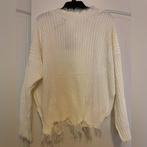 Never worn distresses sweater